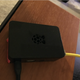 The Raspberry Pi we used. The black USB cable goes to power and the yellow Ethernet cable was used to provide internet access to the Pi.